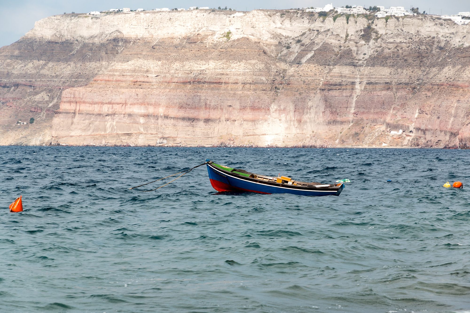 Walking across the volcanic landscape of Nea Kameni